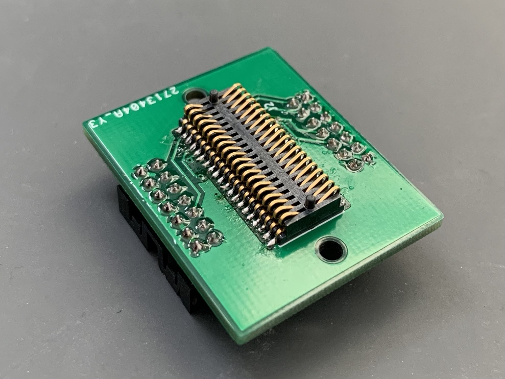JTAG adapter board after assembly with spring-loaded connector showing
