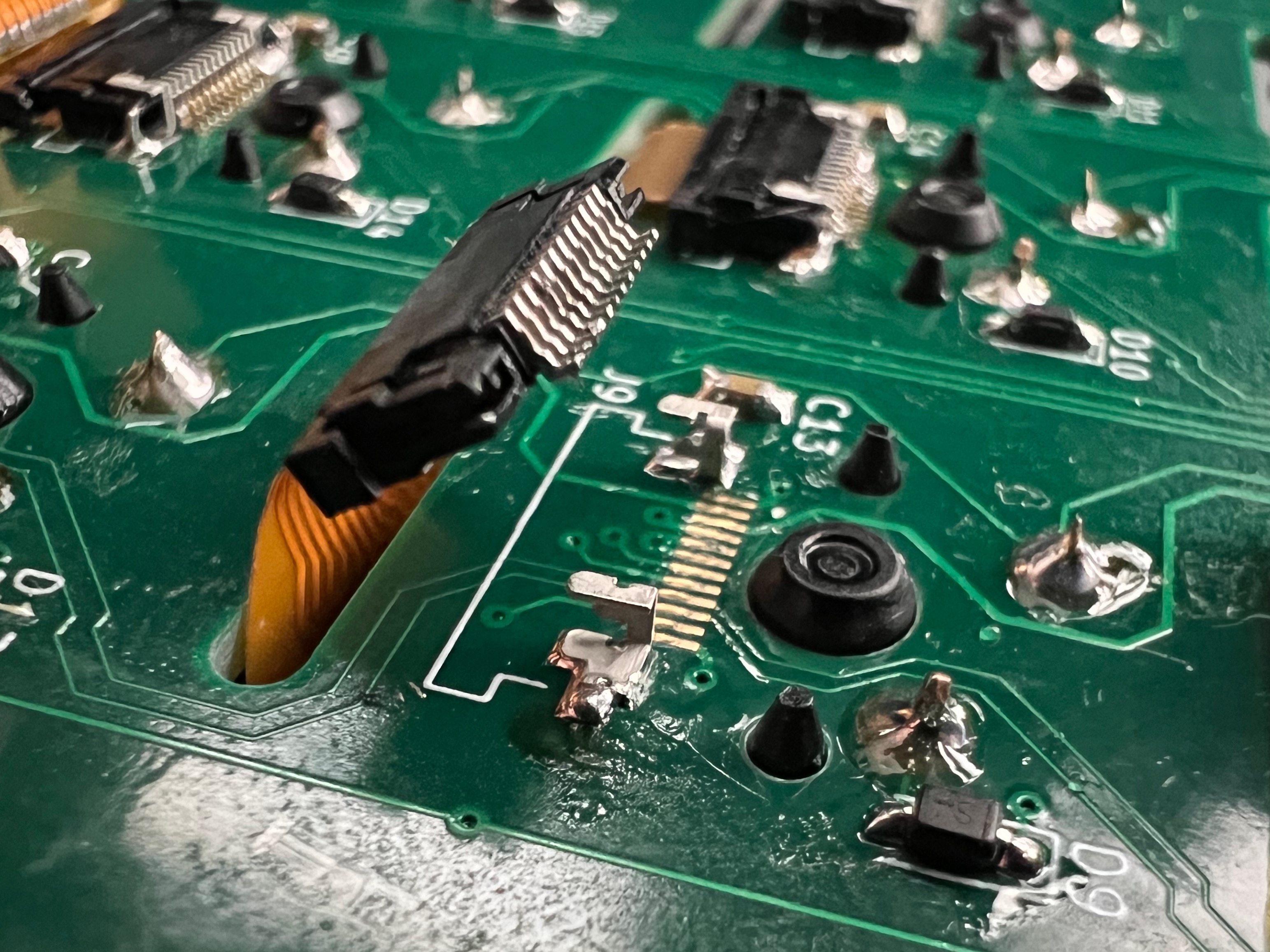 Close up on FFC connector lifted up off the PCB