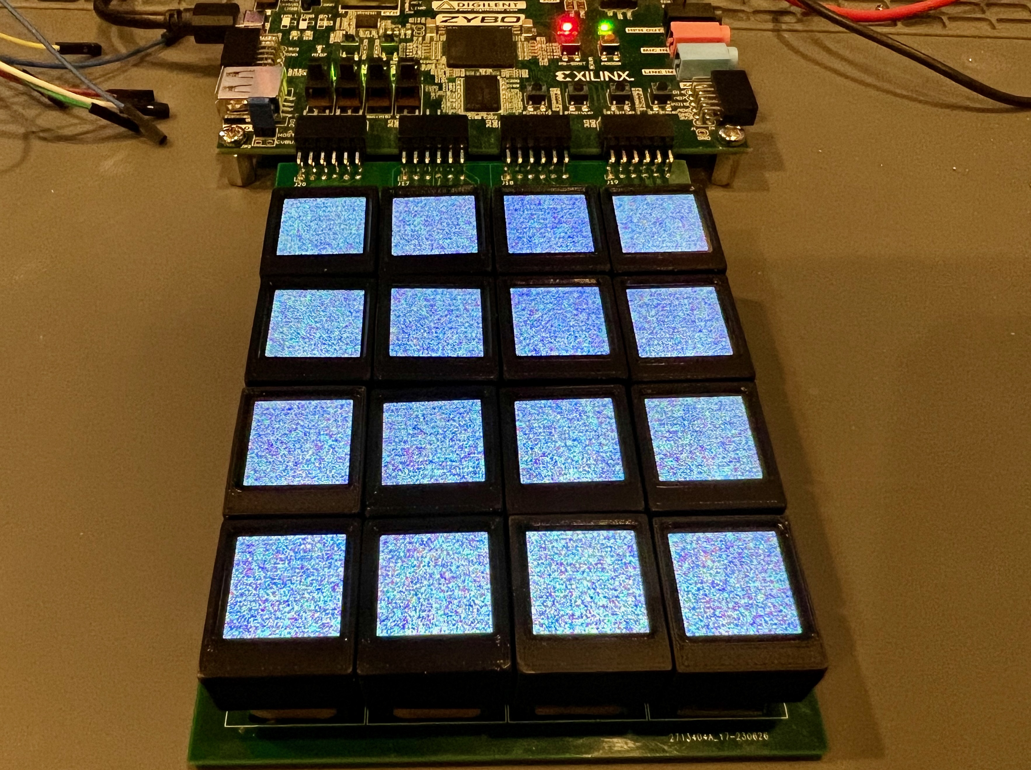 ButtonSlab 4x4 grid hooked up to Zybo FPGA board showing all LCDs turned on with random pixel data (AKA snow)