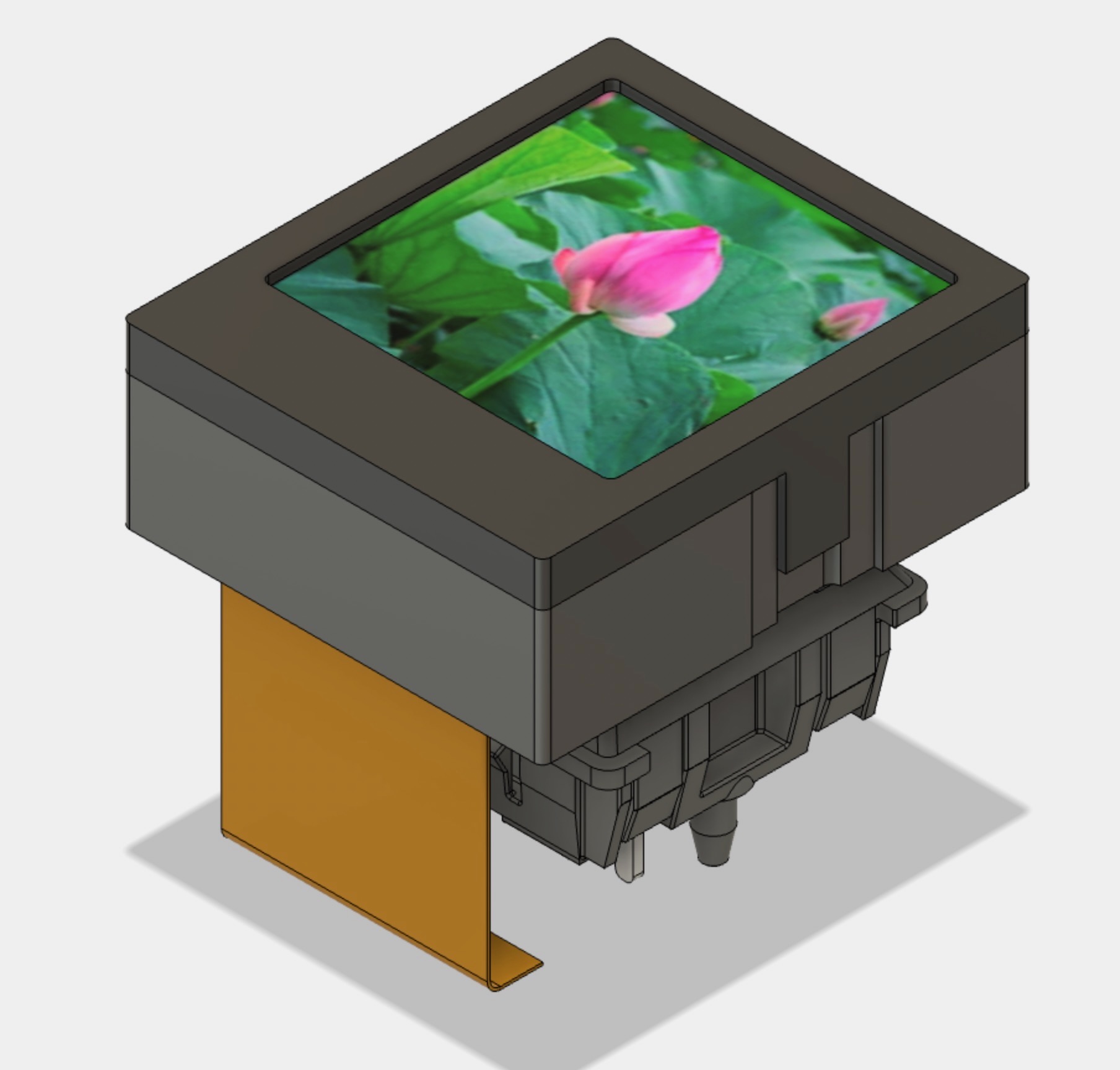 LCD button key cap design in Fusion 360, showing two parts the snap together and mount onto a mechanical key stem, also showing a mock-up picture of a flower on the LCD